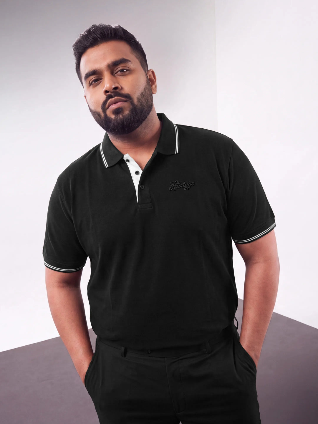 Tuxedo Black PurEase Elevated polo on model, front view
