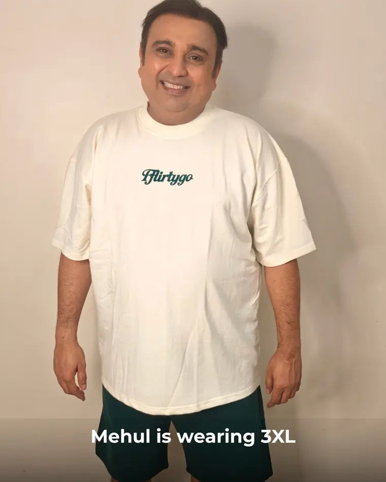 A FflirtyGo customer wearing the basics tee in 3XL